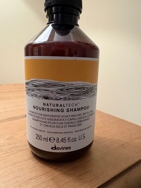 Davines Nourishing Shampoo Bottle with Yellow Label